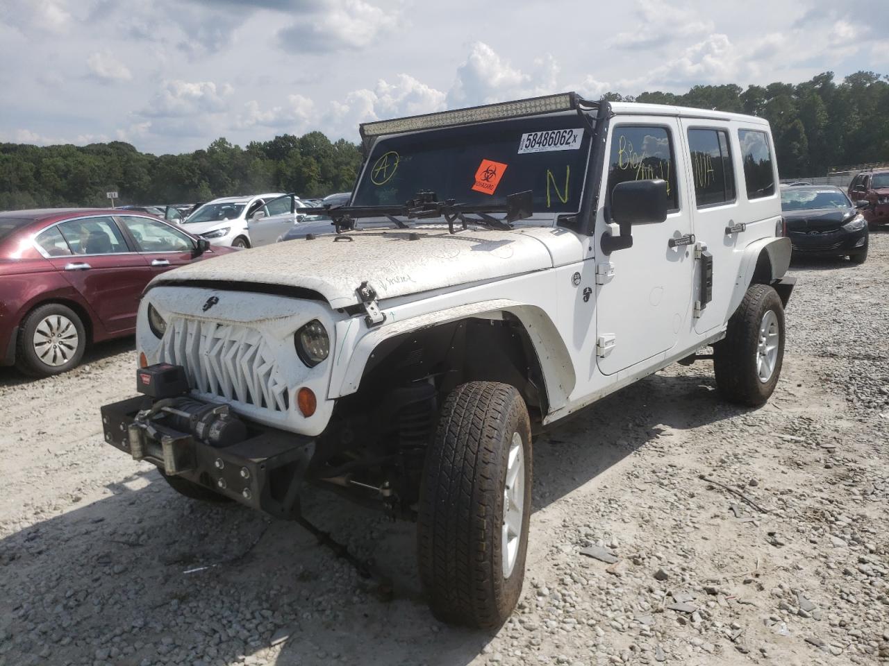 2012 JEEP WRANGLER UNLIMITED SAHARA VIN: 1C4HJWEG3CL123061