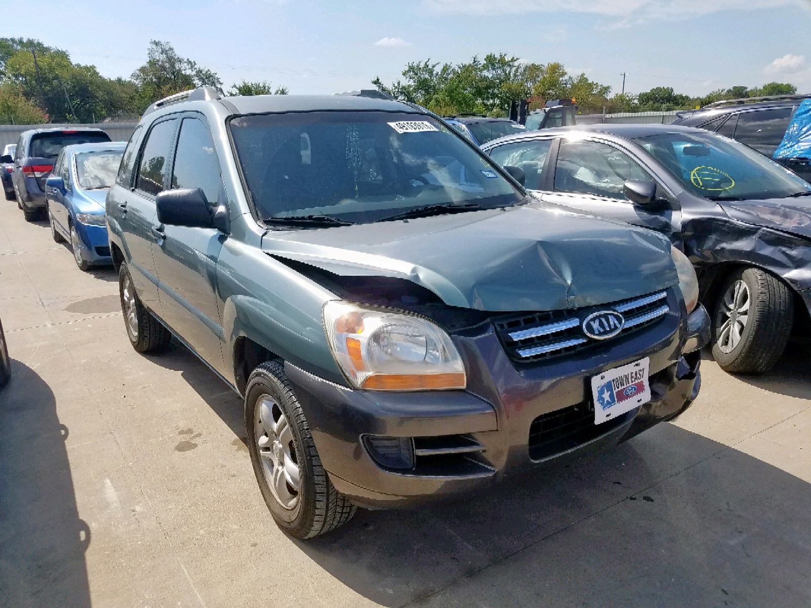 KIA NEW SPORTA 2006, KNDJF723X67239414 — Auto Auction Spot