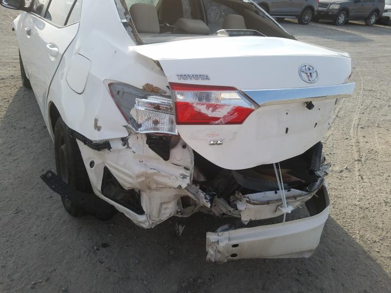VIN: RKLBB9HE1E5003123 Auction: COPART UAE Lot: 34879671 Location: DUBAI INDUSTRIAL CITY - DUBAI VIN: RKLBB9HE1E5003123 TOYOTA COROLLA 2014 WHITE Photo 13