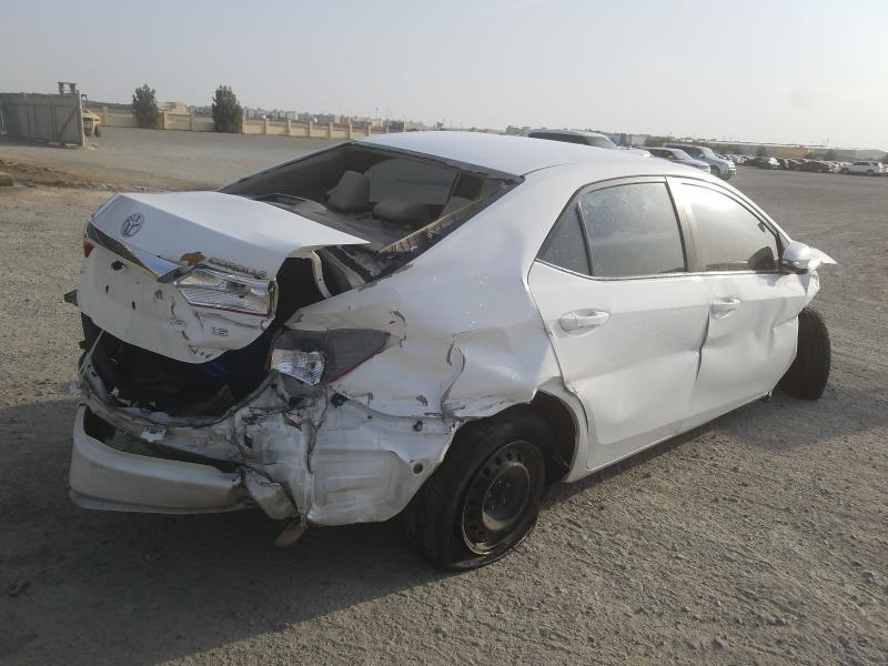 VIN: RKLBB9HE1E5003123 Auction: COPART UAE Lot: 34879671 Location: DUBAI INDUSTRIAL CITY - DUBAI VIN: RKLBB9HE1E5003123 TOYOTA COROLLA 2014 WHITE Photo 4
