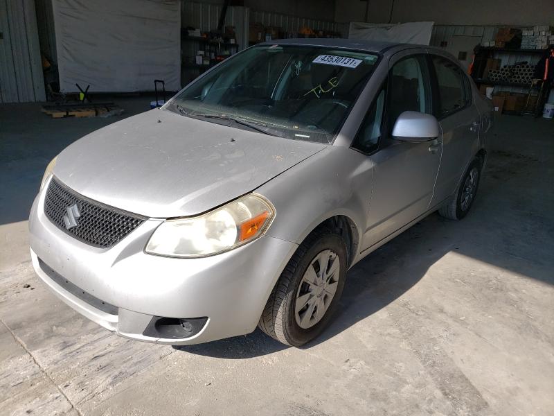 2011 SUZUKI SX4 LE JS2YC5A23B6304257