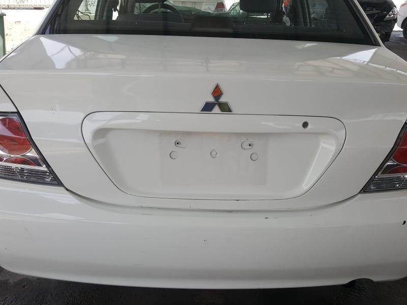 VIN: JMYSRCS1ADU707750 Auction: COPART UAE Lot: 47066141 Location: DUBAI INDUSTRIAL CITY - DUBAI VIN: JMYSRCS1ADU707750 MITSUBISHI LANCER 2013 WHITE Photo 12