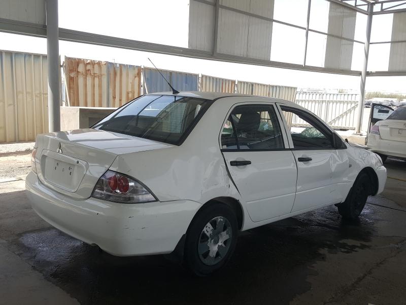 VIN: JMYSRCS1ADU707750 Auction: COPART UAE Lot: 47066141 Location: DUBAI INDUSTRIAL CITY - DUBAI VIN: JMYSRCS1ADU707750 MITSUBISHI LANCER 2013 WHITE Photo 4
