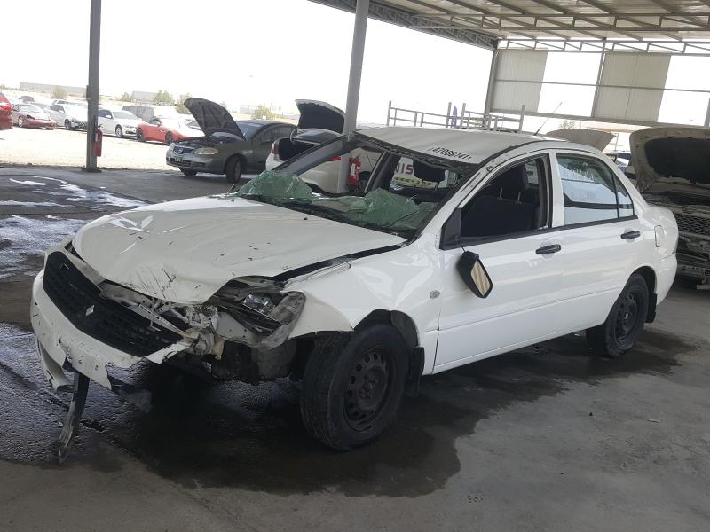 VIN: JMYSRCS1ADU707750 Auction: COPART UAE Lot: 47066141 Location: DUBAI INDUSTRIAL CITY - DUBAI VIN: JMYSRCS1ADU707750 MITSUBISHI LANCER 2013 WHITE Photo 2