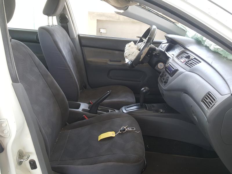 VIN: JMYSRCS1ADU707750 Auction: COPART UAE Lot: 47066141 Location: DUBAI INDUSTRIAL CITY - DUBAI VIN: JMYSRCS1ADU707750 MITSUBISHI LANCER 2013 WHITE Photo 5