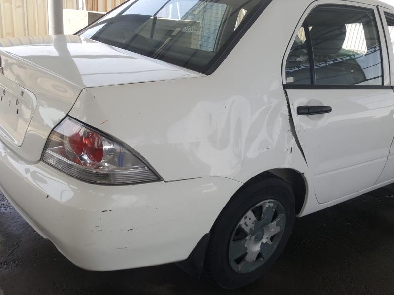 VIN: JMYSRCS1ADU707750 Auction: COPART UAE Lot: 47066141 Location: DUBAI INDUSTRIAL CITY - DUBAI VIN: JMYSRCS1ADU707750 MITSUBISHI LANCER 2013 WHITE Photo 18