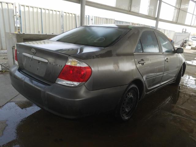 VIN: 4T1BE30K15U622602 Auction: COPART UAE Lot: 52818001 Location: USED VEHICLE AUCTION - DUBAI VIN: 4T1BE30K15U622602 TOYOTA CAMRY 2005 GRAY Photo 4