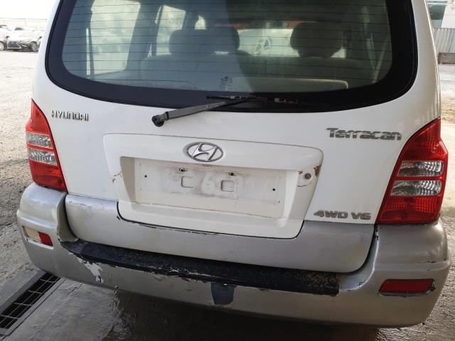 VIN: KMHNM81C75U162365 Auction: COPART UAE Lot: 53576251 Location: DUBAI INDUSTRIAL CITY - DUBAI KMHNM81C75U162365 HYUNDAI TERRACAN 2005 WHITE Photo 12