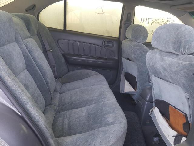 VIN: JN1CCUA32Z0023004 Auction: COPART UAE Lot: 52828741 Location: DUBAI INDUSTRIAL CITY - DUBAI VIN: JN1CCUA32Z0023004 NISSAN MAXIMA 1997 GRAY Photo 6
