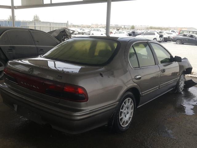 VIN: JN1CCUA32Z0023004 Auction: COPART UAE Lot: 52828741 Location: DUBAI INDUSTRIAL CITY - DUBAI VIN: JN1CCUA32Z0023004 NISSAN MAXIMA 1997 GRAY Photo 4