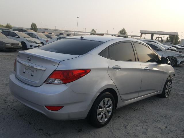 VIN: KMHCT41D6FU828810 Auction: COPART UAE Lot: 56930111 Location: DUBAI INDUSTRIAL CITY - DUBAI VIN: KMHCT41D6FU828810 HYUNDAI ACCENT 2015 SILVER Photo 4