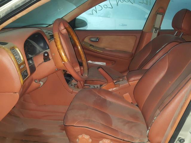 VIN: JN1CA31S0YT181383 Auction: COPART UAE Lot: 52821991 Location: DUBAI INDUSTRIAL CITY - DUBAI VIN: JN1CA31S0YT181383 NISSAN MAXIMA G30 2000 BEIGE Photo 5