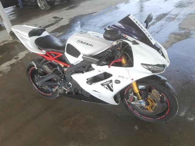 VIN: SMTTMD1166C522395 Auction: COPART UAE Lot: 59597331 Location: DUBAI INDUSTRIAL CITY - DUBAI VIN: SMTTMD1166C522395 TRIUMPH DAYTONA675 2012 WHITE Photo 1