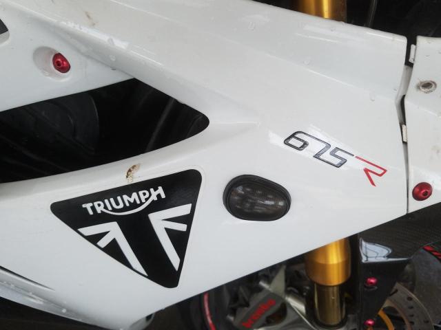 VIN: SMTTMD1166C522395 Auction: COPART UAE Lot: 59597331 Location: DUBAI INDUSTRIAL CITY - DUBAI VIN: SMTTMD1166C522395 TRIUMPH DAYTONA675 2012 WHITE Photo 8