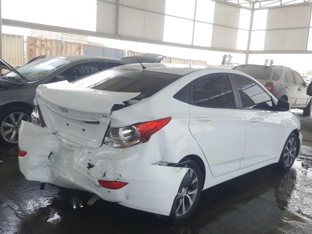 VIN: KMHCT41DBFU645511 Auction: COPART UAE Lot: 59953451 Location: DUBAI INDUSTRIAL CITY - DUBAI VIN: KMHCT41DBFU645511 HYUNDAI ACCENT 2015 WHITE Photo 4