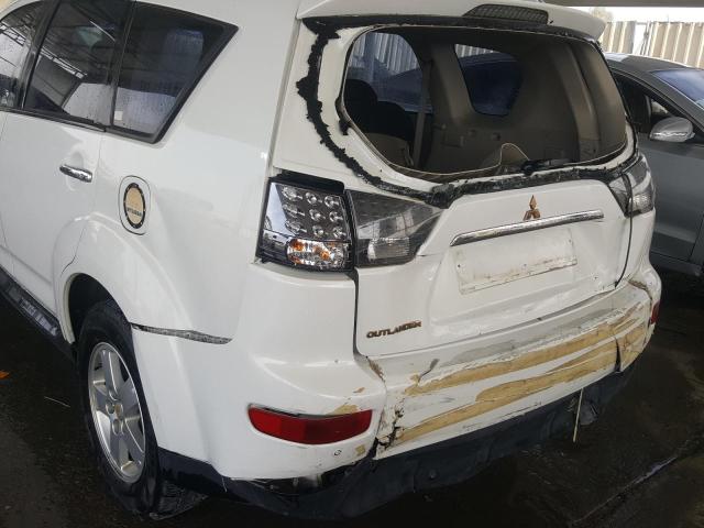 VIN: JMYXTCW5W9Z702120 Auction: COPART UAE Lot: 59956531 Location: DUBAI INDUSTRIAL CITY - DUBAI VIN: JMYXTCW5W9Z702120 MITSUBISHI OUTLANDER 2009 WHITE Photo 9