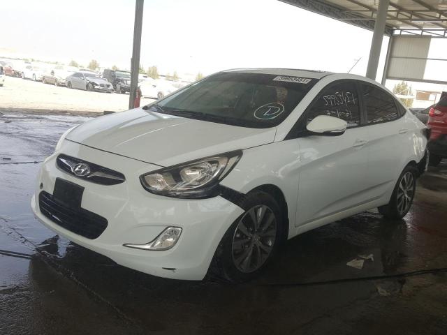 VIN: KMHCT41DBFU645511 Auction: COPART UAE Lot: 59953451 Location: DUBAI INDUSTRIAL CITY - DUBAI VIN: KMHCT41DBFU645511 HYUNDAI ACCENT 2015 WHITE Photo 2