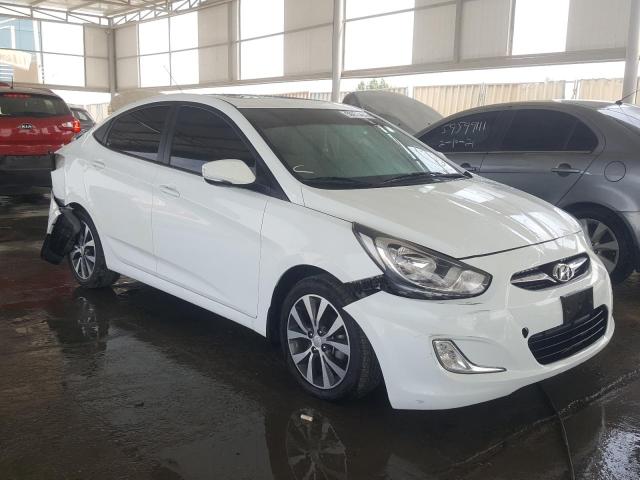 VIN: KMHCT41DBFU645511 Auction: COPART UAE Lot: 59953451 Location: DUBAI INDUSTRIAL CITY - DUBAI VIN: KMHCT41DBFU645511 HYUNDAI ACCENT 2015 WHITE Photo 1