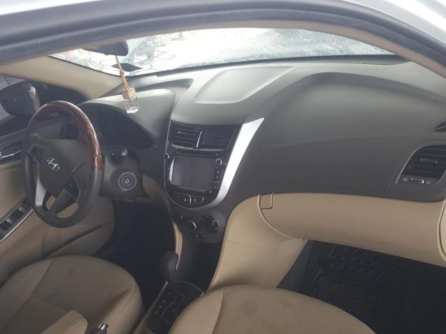 VIN: KMHCT41DBFU645511 Auction: COPART UAE Lot: 59953451 Location: DUBAI INDUSTRIAL CITY - DUBAI VIN: KMHCT41DBFU645511 HYUNDAI ACCENT 2015 WHITE Photo 15