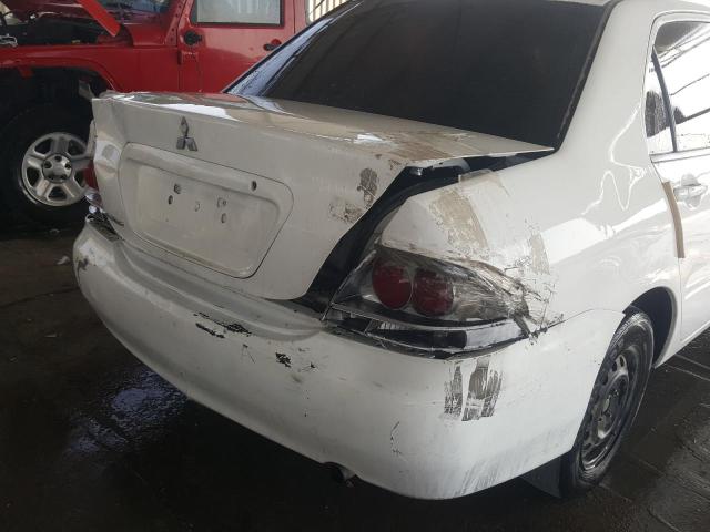 VIN: JMYSRCS1A8U723787 Auction: COPART UAE Lot: 59577191 Location: DUBAI INDUSTRIAL CITY - DUBAI VIN: JMYSRCS1A8U723787 MITSUBISHI LANCER 2008 WHITE Photo 9