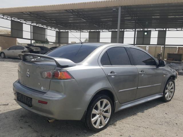 VIN: JMYSTCY4ACU704367 Auction: COPART UAE Lot: 59599111 Location: DUBAI INDUSTRIAL CITY - DUBAI VIN: JMYSTCY4ACU704367 MITSUBISHI LANCER 2012 GRAY Photo 4