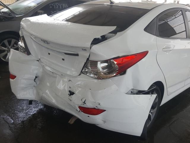 VIN: KMHCT41DBFU645511 Auction: COPART UAE Lot: 59953451 Location: DUBAI INDUSTRIAL CITY - DUBAI VIN: KMHCT41DBFU645511 HYUNDAI ACCENT 2015 WHITE Photo 17