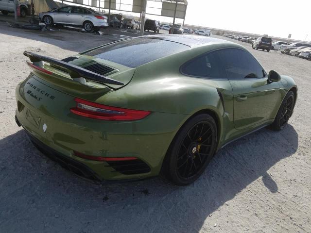 VIN: WP0ZZZ99ZHS160475 Auction: COPART UAE Lot: 60491351 Location: DUBAI INDUSTRIAL CITY - DUBAI VIN: WP0ZZZ99ZHS160475 PORSCHE 911 2017 GREEN Photo 4