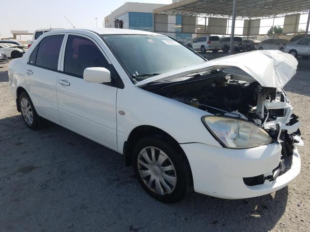 VIN: JMYSRCS3ABU707517 Auction: COPART UAE Lot: 60662461 Location: DUBAI INDUSTRIAL CITY - DUBAI VIN: JMYSRCS3ABU707517 MITSUBISHI LANCER 2011 WHITE Photo 1