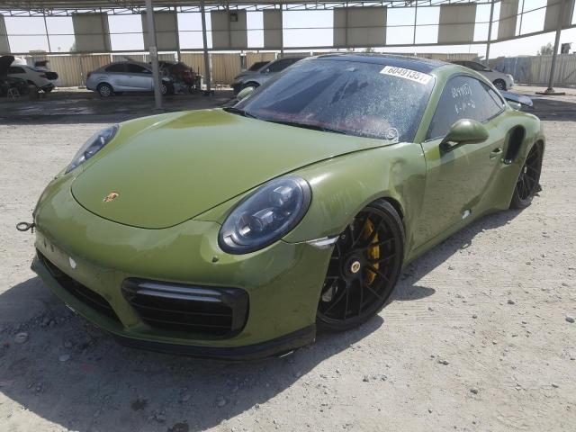 VIN: WP0ZZZ99ZHS160475 Auction: COPART UAE Lot: 60491351 Location: DUBAI INDUSTRIAL CITY - DUBAI VIN: WP0ZZZ99ZHS160475 PORSCHE 911 2017 GREEN Photo 2
