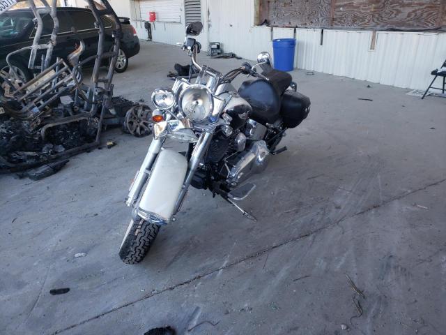 2011 HARLEY-DAVIDSON FLSTN 1HD1JD518BB044814