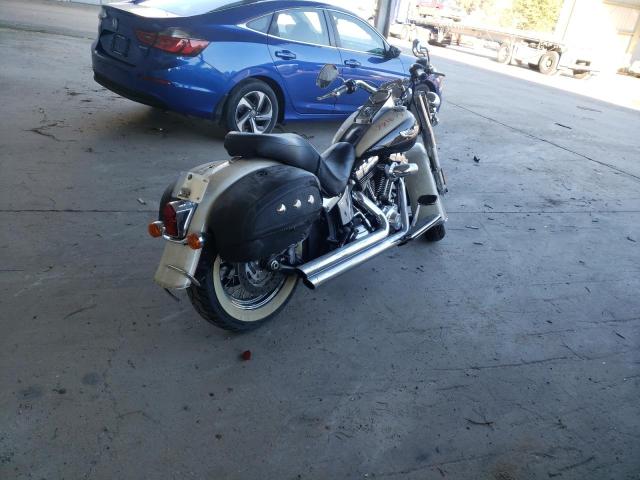2011 HARLEY-DAVIDSON FLSTN 1HD1JD518BB044814