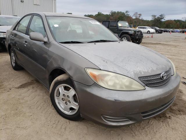 Salvage cars for sale from Copart Jacksonville, FL: 2003 Toyota Camry LE