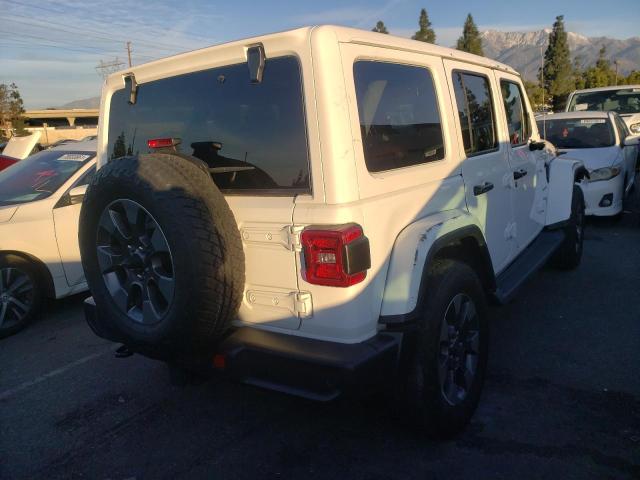 1C4HJXEN5JW199042 Jeep Wrangler U 2018. Фото: 3