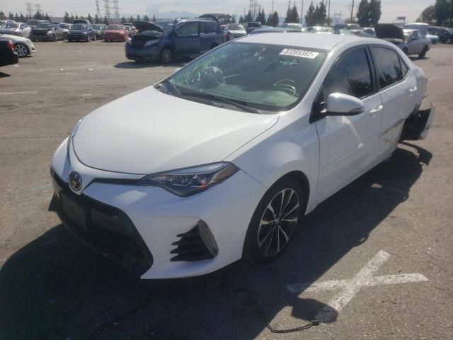 5YFBURHE3KP899799 Toyota Corolla L 2019. Фото: 1