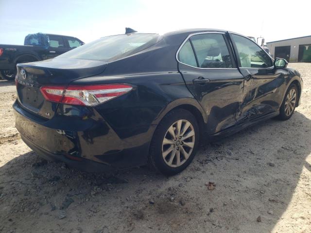 4T1B11HK8KU704813 Toyota Camry L 2019. Фото: 3