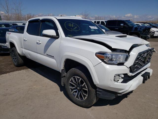 Salvage cars for sale from Copart Ontario Auction, ON: 2021 Toyota Tacoma DOU