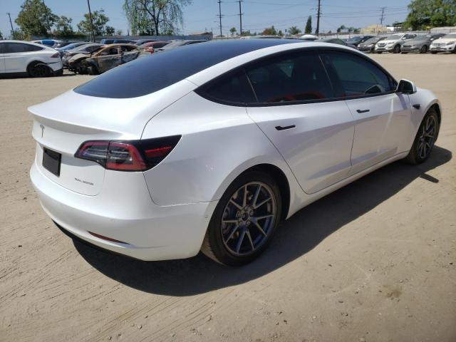 5YJ3E1EB7MF869653 Tesla Model 3 2021. Фото: 3