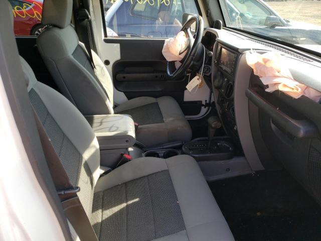 1J8GA39159L736915 Jeep Wrangler U 2009. Фото: 4