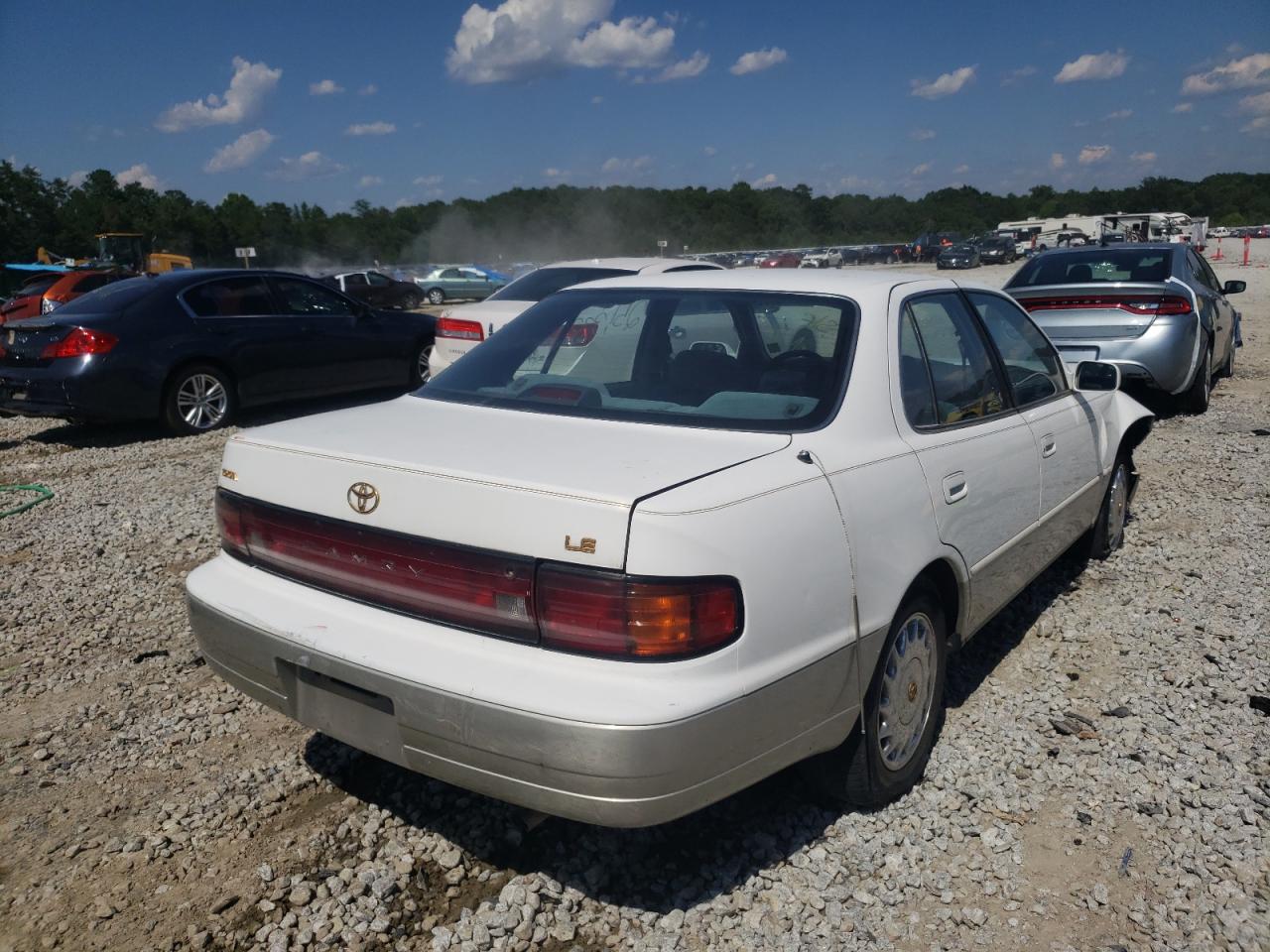 1993 Toyota Camry Le VIN: JT2SK12E1P0176110 Lot: 66553024