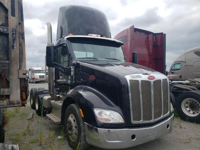 Salvage trucks for sale at Cahokia Heights, IL auction: 2018 Peterbilt 579
