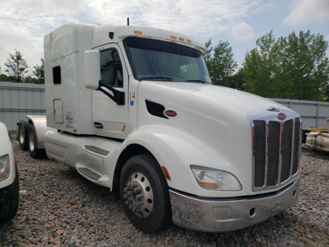 Salvage trucks for sale at Avon, MN auction: 2014 Peterbilt 579