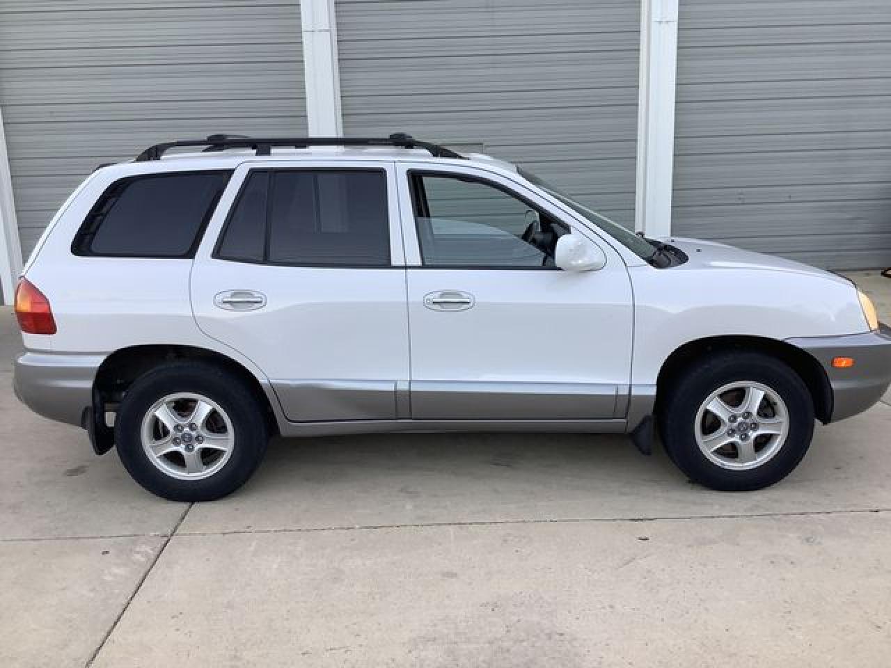 2002 Hyundai Santa Fe Gls VIN: KM8SC73D12U150049 Lot: 58060312