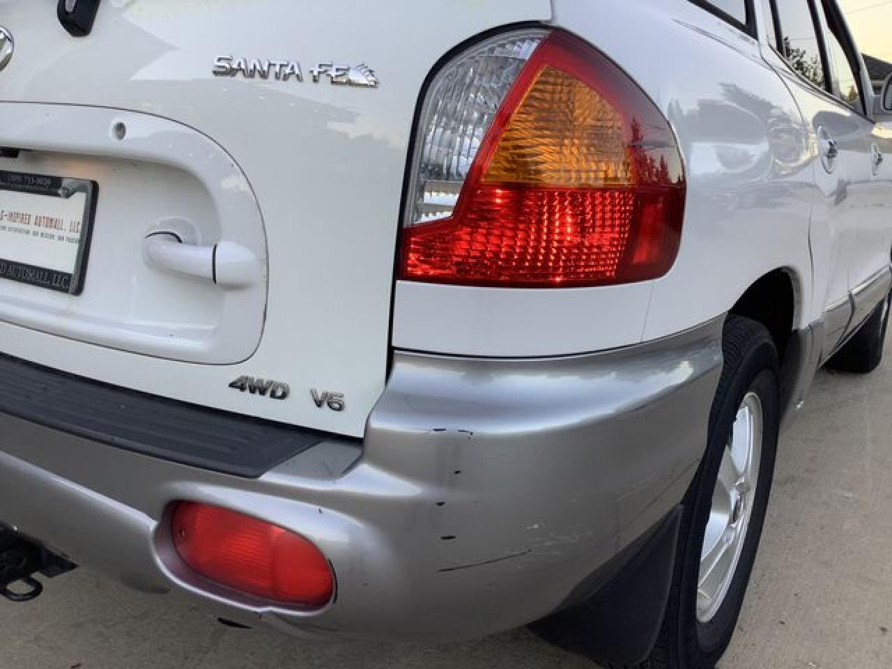2002 Hyundai Santa Fe Gls VIN: KM8SC73D12U150049 Lot: 58060312