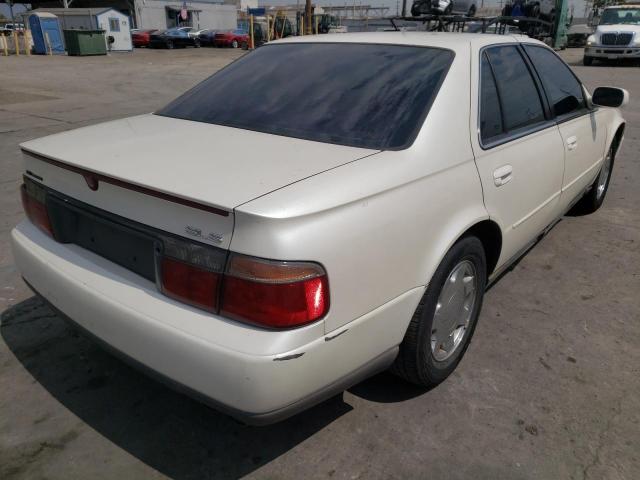 VIN: 1G6KS54Y5YU178753 Auction: COPART Lot: 58805362 Location: CA - LOS ANGELES VIN: 1G6KS54Y5YU178753 CADILLAC SEVILLE 2000 BEIGE Photo 4