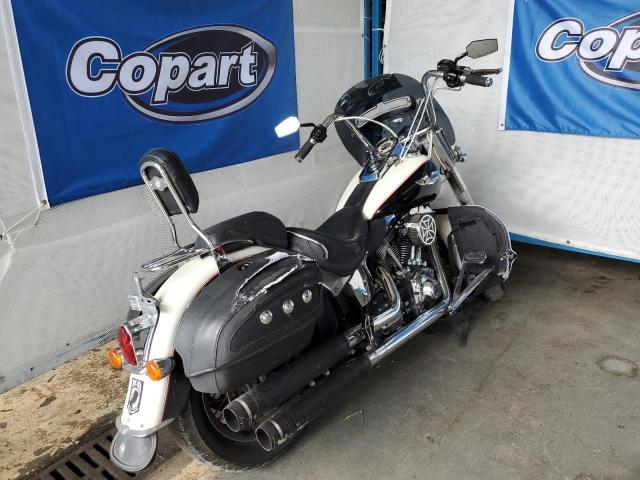 2011 HARLEY-DAVIDSON FLSTN 1HD1JD51XBB041333
