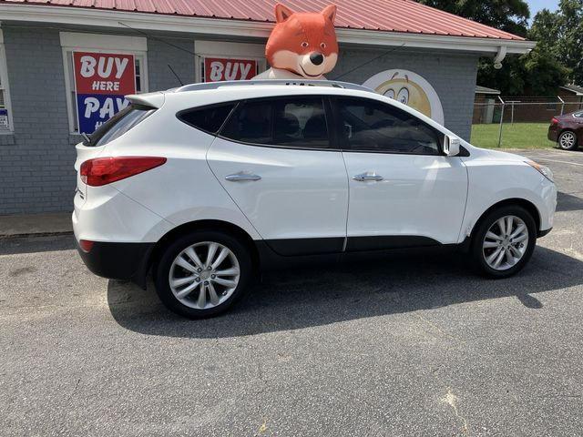 VIN: KM8JU3AC7DU692822 Auction: COPART Lot: 59233182 Location: GA - ATLANTA EAST KM8JU3AC7DU692822 HYUNDAI TUCSON 2013 WHITE Photo 16