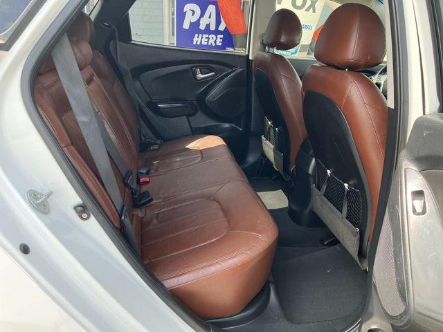 VIN: KM8JU3AC7DU692822 Auction: COPART Lot: 59233182 Location: GA - ATLANTA EAST KM8JU3AC7DU692822 HYUNDAI TUCSON 2013 WHITE Photo 9