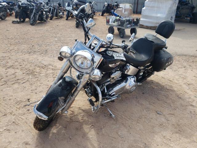 2010 HARLEY-DAVIDSON FLSTN 1HD1JD510AB034065