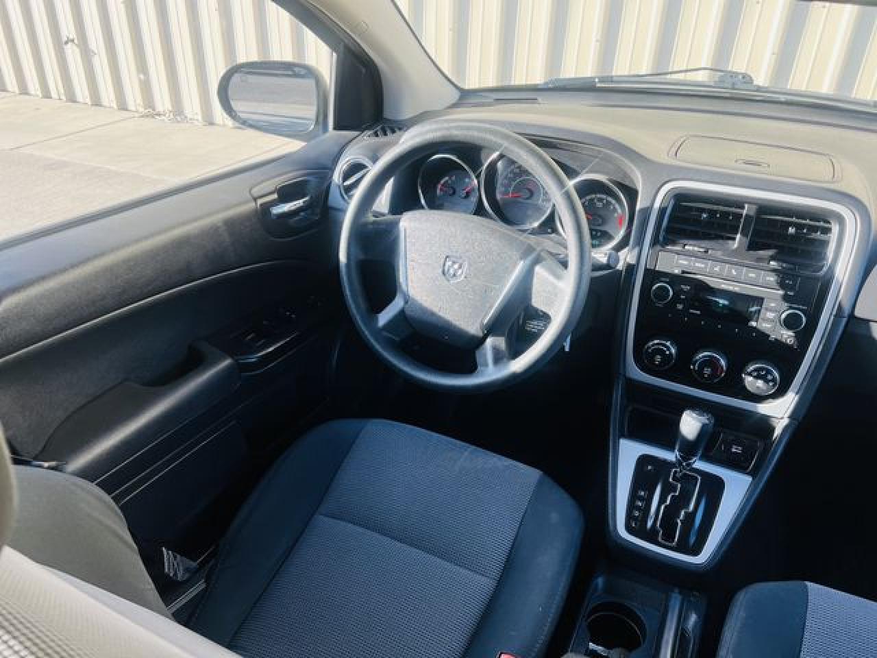 2010 Dodge Caliber Sxt VIN: 1B3CB4HA5AD536353 Lot: 62740722