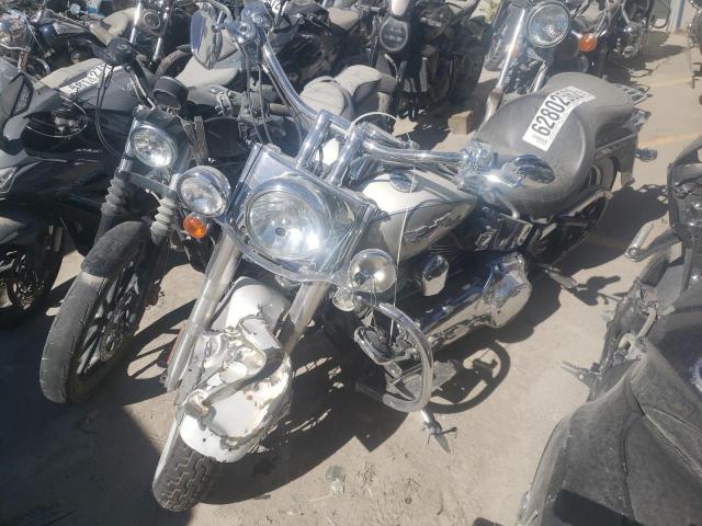 2009 HARLEY-DAVIDSON FLSTN 1HD1JD5199Y044182